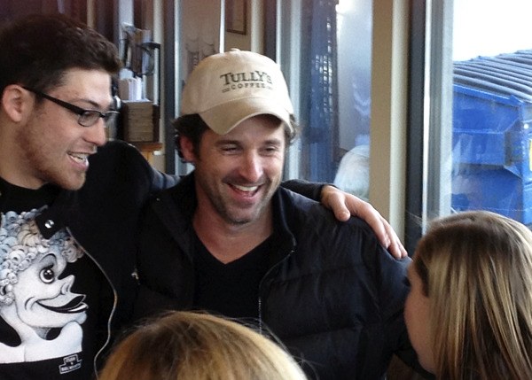 Actor Patrick Dempsey greets fans at the Tully's Coffee on Mercer Island. Dempsey and his investment group purchased the Seattle-based coffee chain during an auction last night.