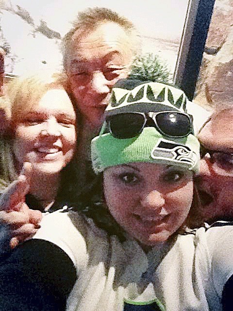 The Segawa family in Bellevue shows its Seahawks pride after watching the NFC championship.