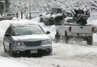 Slushy roads continue to be a problem in Bellevue as more snow fell on the city Wednesday.
