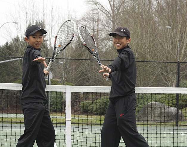 James (left) and Thomas Yu at a tennis court near their former home in Factoria