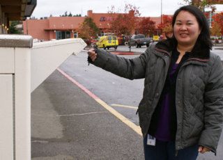 A vote for McCain Thu Le of Bellevue was up early to drop her ballot at the Crossroads Connection library at Crossroads Bellevue mall Tuesday morning. Her favorite candidate? John McCain. Le was one of a  stream of voters making use of the voting drop box at the mall. Absentee ballots could be dropped off at a number of secure boxes at area libraries Tuesday. Other voters were headed to their polling places. King County anticipates more than 287