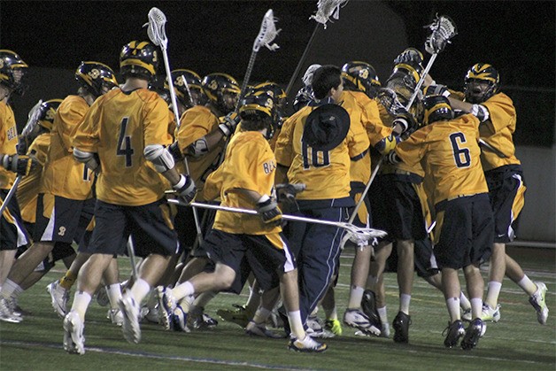 Bellevue's win set off a field storming celebration on the turf of their rivals