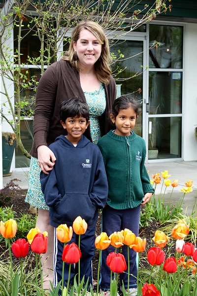 Chestnut Hill Academy teacher Vicki Conrad stands with students Rahul Sundaresan