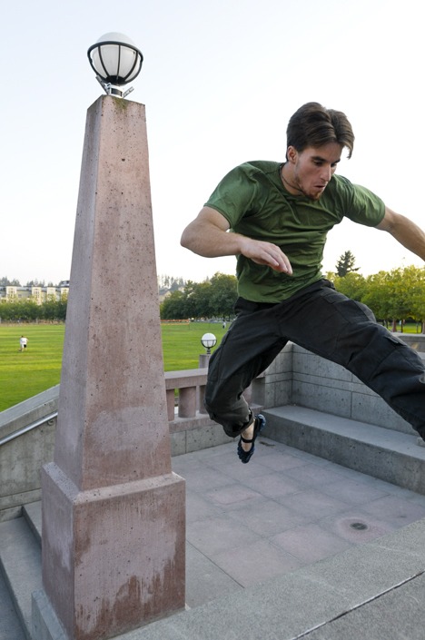 Tyson Cecka practices parkour at Bellevue Downtown Park. Cecka is executive director of Parkour Visions.