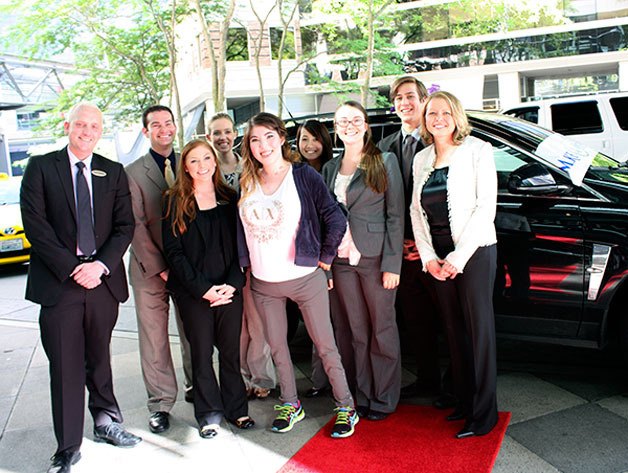 Lauren Smith poses with members of the Hyatt Regency Bellevue staff on Saturday