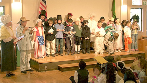 Students at Bellevue's Eton School celebratE Halloween by highlighting  a person from history who has made a positive difference in the world. At a Historic Halloween assembly