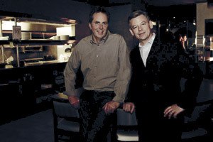 Bradley Dickinson (left) and Mikel Rogers (right) pose in their restaurant Pearl Bar & Dining. The two-man  restaurateur team will open KORAL at the Hyatt Regency hotel in February.