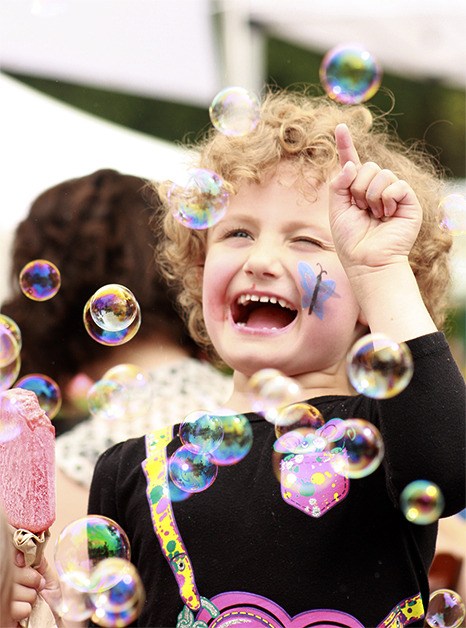 A young girl enjoyed bubbles