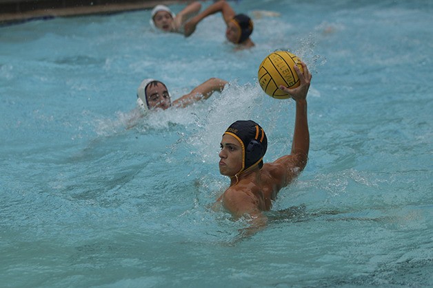 Bellevue Wolverines’ Zack Rossman rears back to unleash a shot earlier this season.