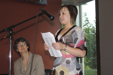 Alyssa Olsen talks during a town hall meeting in Bellevue about how her health-insurance provider refused to cover a marrow transplant that saved her life.