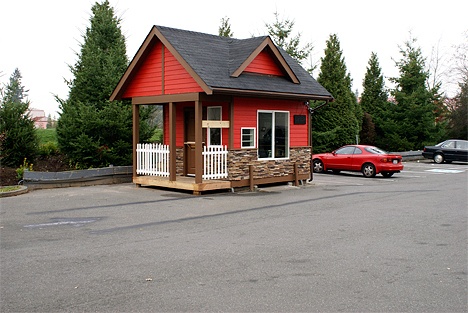 The Knotty Bodies espresso stand in Crossroads did not open on Friday and reportedly is now closed. The stand's sign has been removed and marking for a drive-through lane have been painted over. The stand drew community opposition when it opened with bikini-clad baristas adjacent to a city park frequented by children.