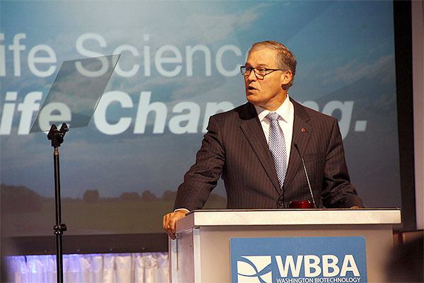 Gov. Jay Inslee addresses the crowd during the 25th Washington Biotechnology & Biomedical Association summit on Oct. 24