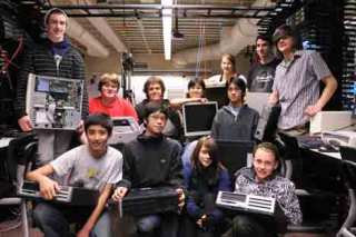 Members of the Cisco Networking Academy at Newport High School will be taking refurbished computers to Antigua. Front row from left