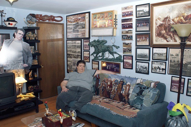 Nancy Fernandes relaxes in one of the themed rooms in her Bellevue home