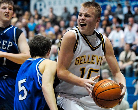 Wolverine forward Nate Sikma (10) drives to the basket late the game against Seattle Prep during Sea-King district tournament play at Bellevue College on Friday. Bellevue won 50-44.