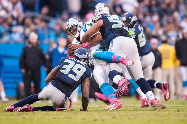 A fast and physical Seahawks defense kept Carolina quarterback Cam Newton from being anything close to 'super'.