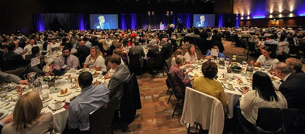 Bellevue College President Dr. David Rule addresses the crowd at the Meydenbauer Center during the 15th annual “Become Exceptional” luncheon.