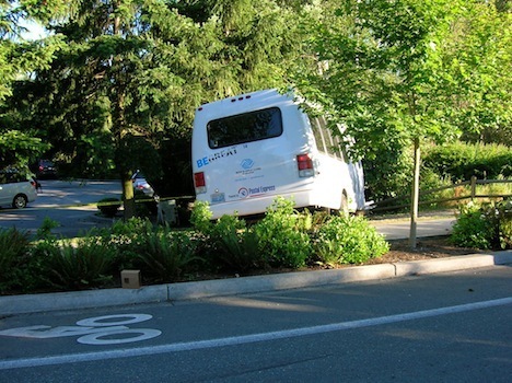 A Bellevue Boys & Girls Club van struck a SUV and then hit a tree.