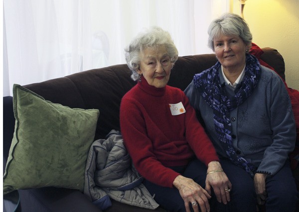 Jo Bourgoin (left) and Jeri Albertini catch up during this month’s gathering at Let’s Do Lunch in Bellevue.
