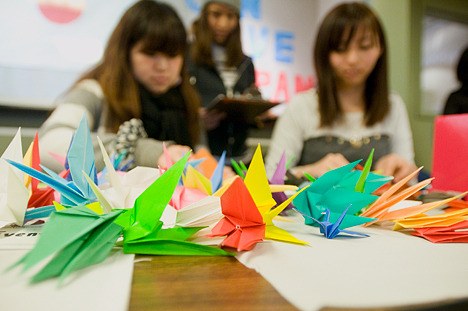Students fold colorful oragami cranes at Bellevue College to raise money for Japan assistance.