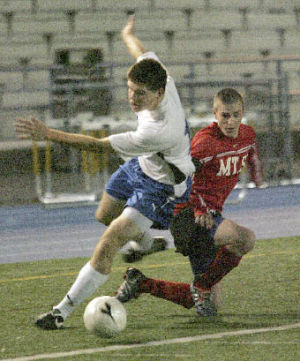 Bellevues Race Sciabica goes for the ball with a Mt. Si player during a home game Friday