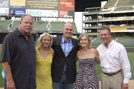 Mike Holmgren (left) was honorary auction chair at the 10th Annual Field of Dreams Dinner and Auction