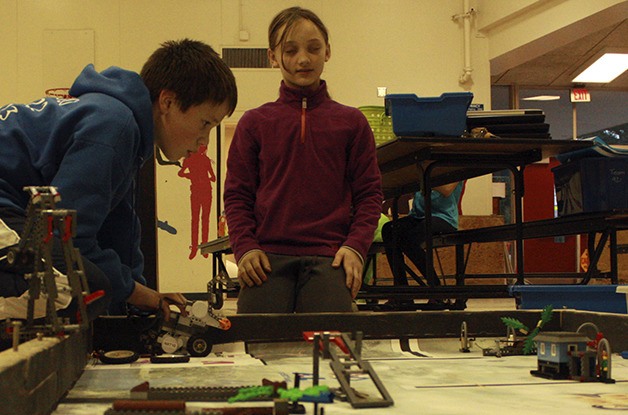 Torin McGrath and Madeline Justice practice with their Lego robot a few days before the Jan. 25 Washington First Lego League tournament in Edmonds.