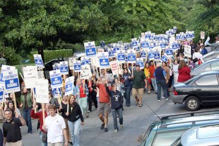 Hundreds of Bellevue school teachers and others picket the Bellevue School Board meeting Wednesday as the teachers and district continue to seek agreement on a new contract.