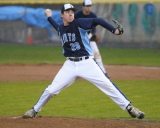 Interlake right-hander Matt Allan delivers the ball in last Tuesday's game against Mercer Island. Allan was tagged with the loss against Bellevue on Friday.