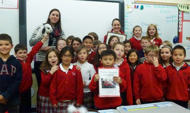 Students at St. Louise School show their appreciation for help given to their pet