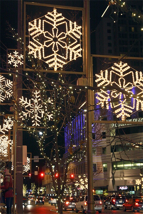 Toy soldiers drum to the beat of the holiday season Monday night as ‘snow’ begins its nightly fall on Snowflake Lane in Bellevue. The magical performance takes place along the sidewalks of Bellevue Way and Northeast Eighth Street at The Bellevue Collection. The celebration kicks off every evening at 7 p.m.