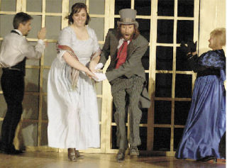 Faculty members at Sacret Heart School practice a dance number in the school’s upcoming performance of a Christmas Carol. Snow canceled the originally scheduled date.