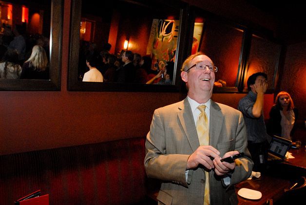 Bellevue City Council member John Chelminiak enjoys a happy moment as election returns Tuesday night gave him a commanding lead over his opponent.
