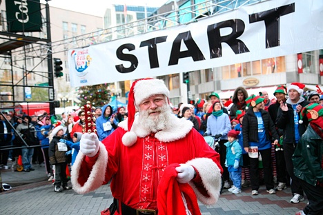 Santa stands at the starting line of last year's Jingle Bell Run in Seattle benefiting the Arthritis Foundation.