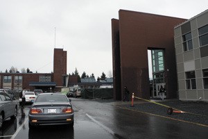 The brick entryway in the newly-built Bellevue High School towers over the old building