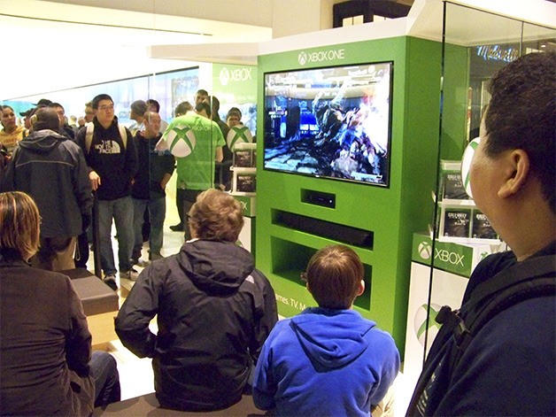 Gamers play Killer Instinct on the new Xbox One inside the Bellevue Square Mall on Thursday night during the midnight launch party for the new console.