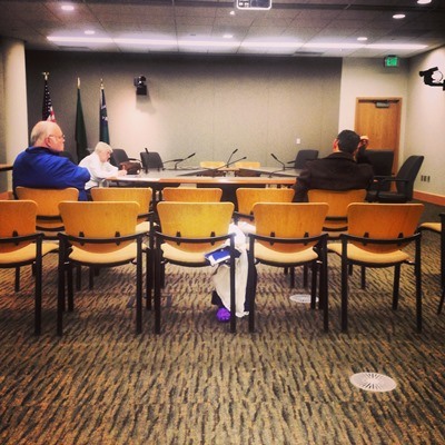 Residents wait in City Hall for WSDOT staff to take questions on possible I-90 tolling.