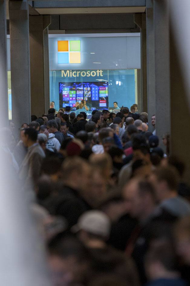 Customers wait outside the Bellevue Microsoft store for the release of the Surface tablet and Windows 8.