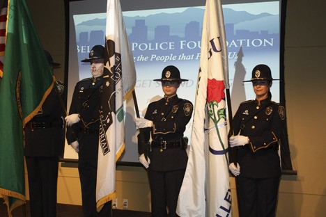 Members of the Bellevue Police Department's honor guard participate in the pledge of allegiance during the first official fundraiser for the Bellevue Police Foundation.