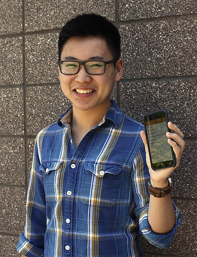 Bill Wu displays his iPhone and Android app.