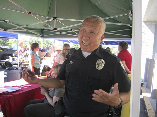 Detective Richard Chinn says that  burglaries and block watches are some of the most popular topics of conversation at National Night Out.