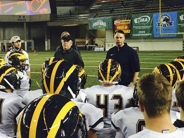 Bellevue Wolverines head football coach Butch Goncharoff addresses his team following their 56-28 win against the Bishop Blanchet Braves in the Class 3A semifinals on Nov. 27 at the Tacoma Dome.