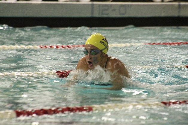 Bellevue's Kim Williams swims toward the finish line in the 100-meter breaststroke.