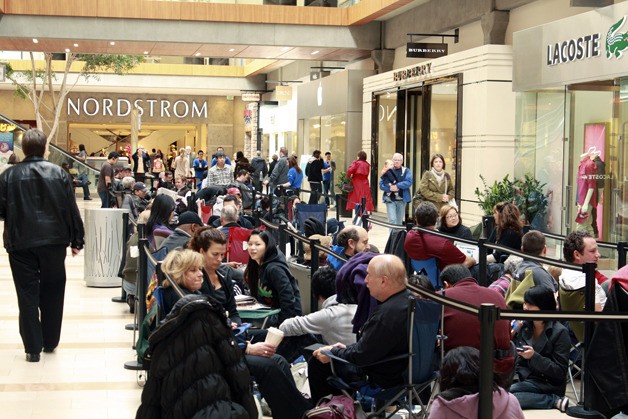 Eager Apple fans packed Bellevue Square in anticipation of the release of the iPad 2 Friday evening