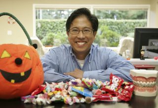 Dr. Wisanu Charoenkul is a Bellevue orthodontist who will give kids $1 per pund of any candy they bring in from trick-or-treating. He also will match that donation to the Bellevue Boys and Girls Club.