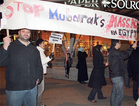 Several hundred Egyptians from the Eastside picketed in Downtown Bellevue on Wednesday night