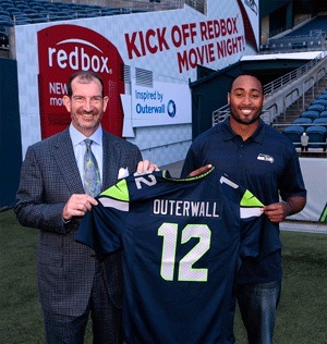 Bellevue-based Outerwall and its consumer business lines have teamed up with the Seattle Seahawks Spirit of 12 Partners