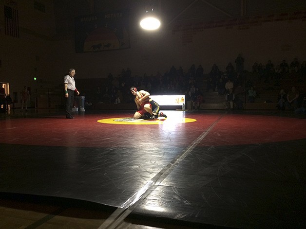 Newport 285-pound grappler Nolan Richardson tries to escape the grasp of Inglemoor's Alex Rodriguez. Richardson pinned Rodriguez in the second round.