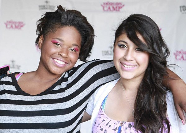 Mimi Broswell (left) and Vanessa Sanchez (right) celebrate at the final ceremony that marked the end of Fashion Camp 2012.