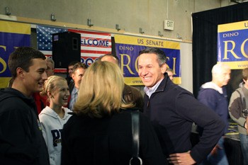 Dino Rossi spoke with numerous supporters after the Monday evening rally at his campaign headquarters.